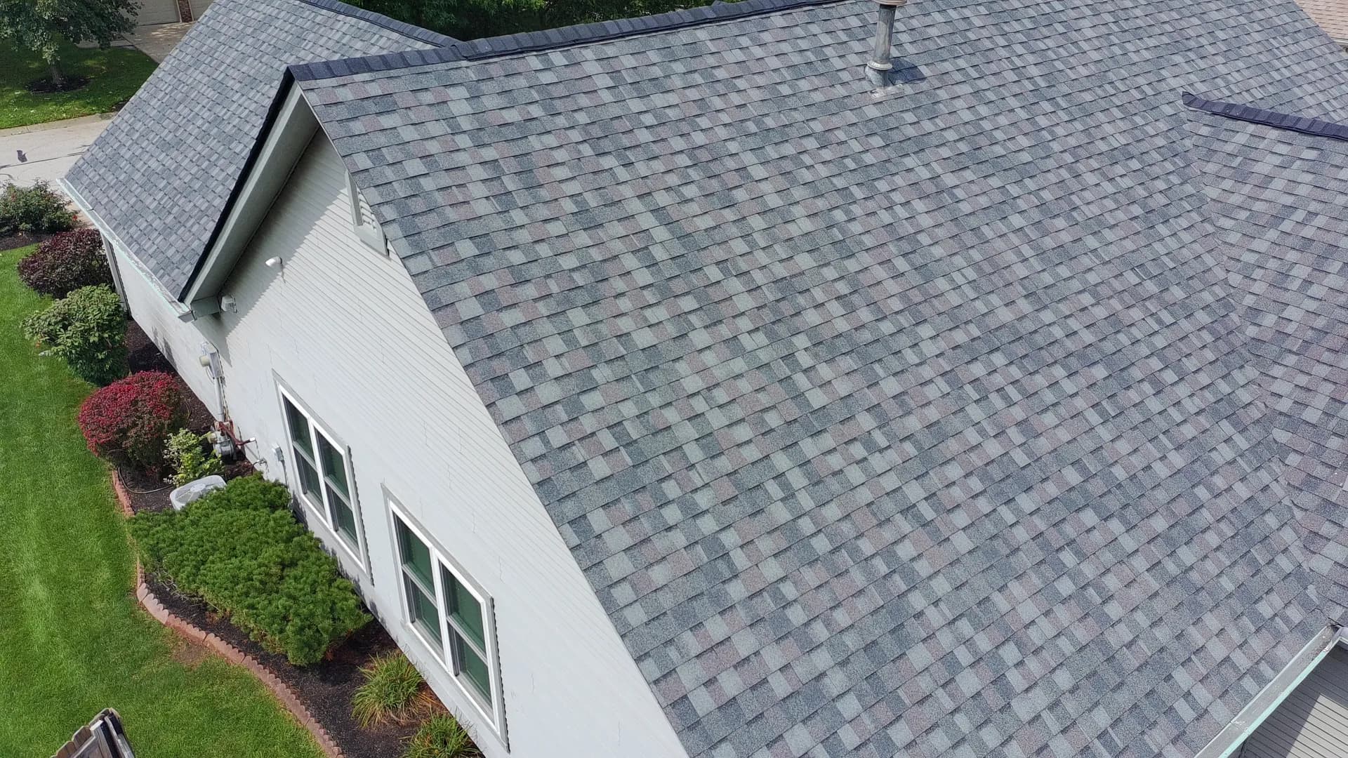 Close aerial view of architectural shingles on a 317 Roofing Co. roof in Central Indiana