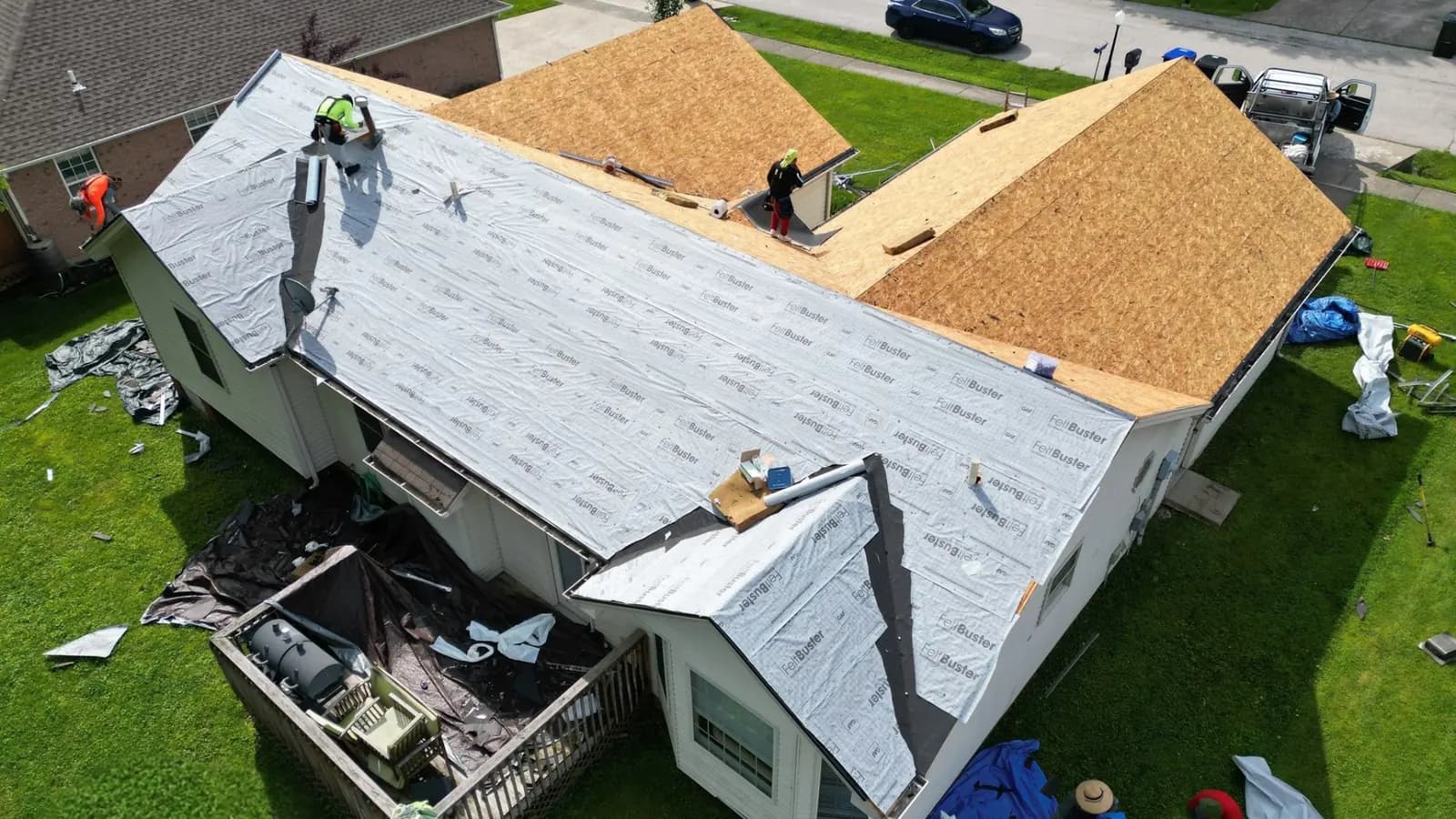317 Roofing Co. roof replacement in progress showing the layered roofing system